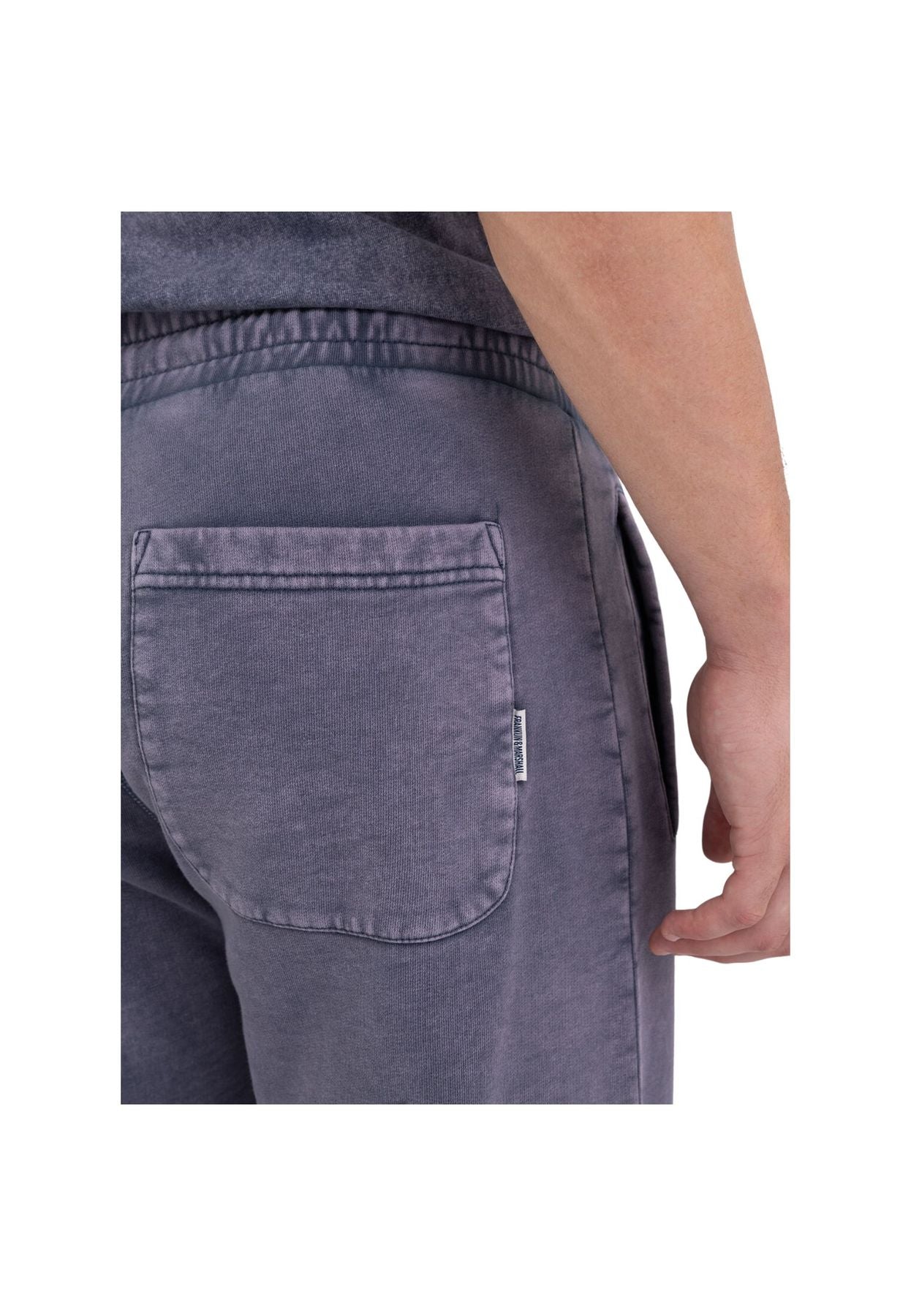 Pantaloni in tuta blu slavato